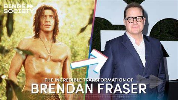 Brendan Fraser is suave in a gray suit beside his glam partner Jeanne