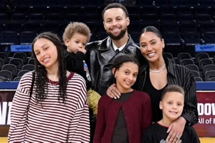 Steph Curry and family pose with championship trophy in adorable photos