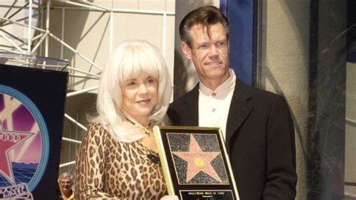 The Odd Story Behind Randy Travis's First Marriage
